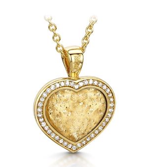 "Gold halo heart pendent on a gold chain"