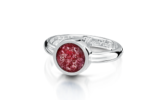 "silver ring with a red circular stone"