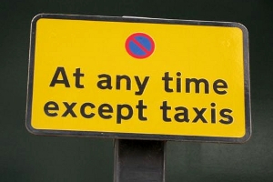 no stopping except taxis sign