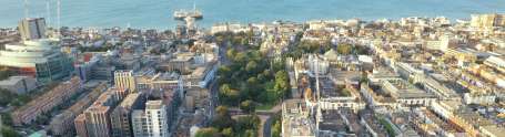 Ariel view of Brighton and Hove from Grand Parade down to the seafront and Brighton Palace Pier