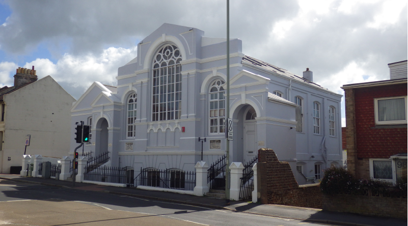 Image Orchard Day Nursery, Queens Park Road. A large white and blue building.