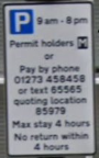 Sign for a shared parking bay. Blue P logo. 9am to 8pm. Permit holders or pay by phone. Max stay 4 hours.