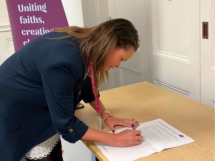 Council Leader Bella Sankey signing the Brighton & Hove Faith Covenant.