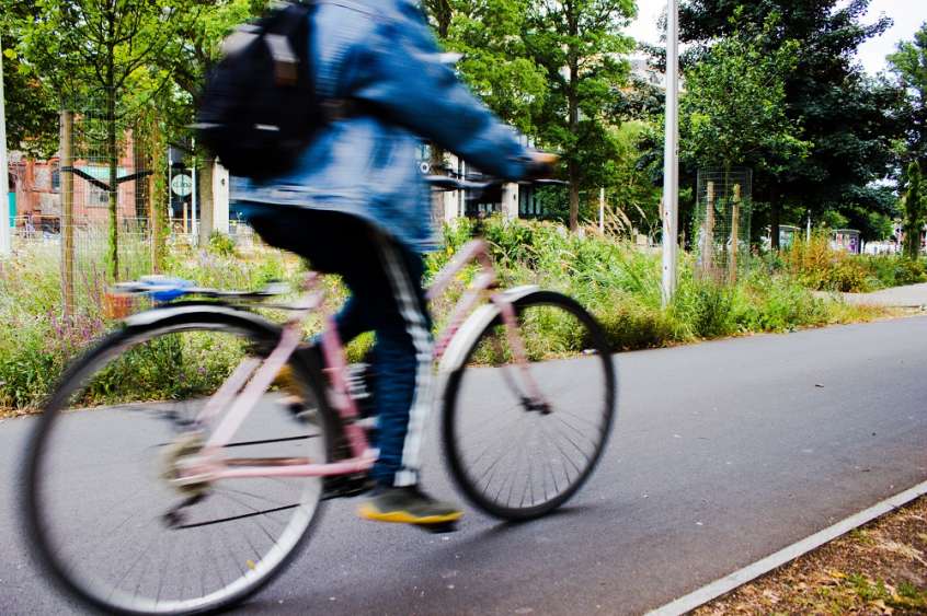 Person riding a bike.