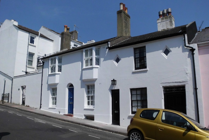 The street frontage of the two houses.