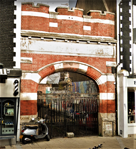 Red brick and stone archway from York Place.