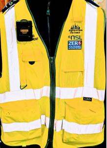 Bright yellow civil enforcement officer vest