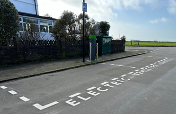 An on-street electric vehicle charging bay and charger 