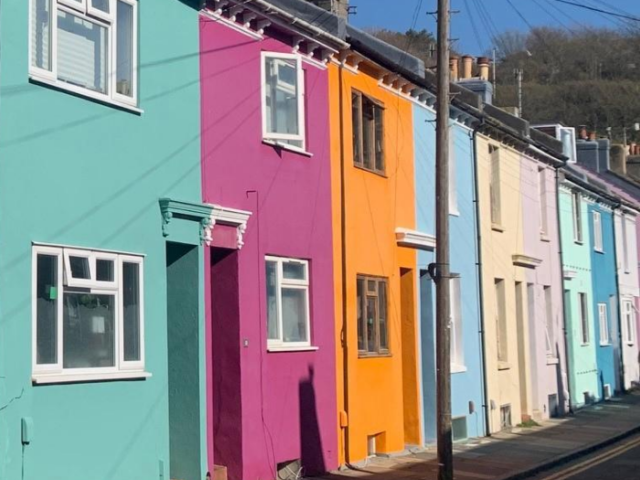 Multi-coloured terrace houses in the sunshine