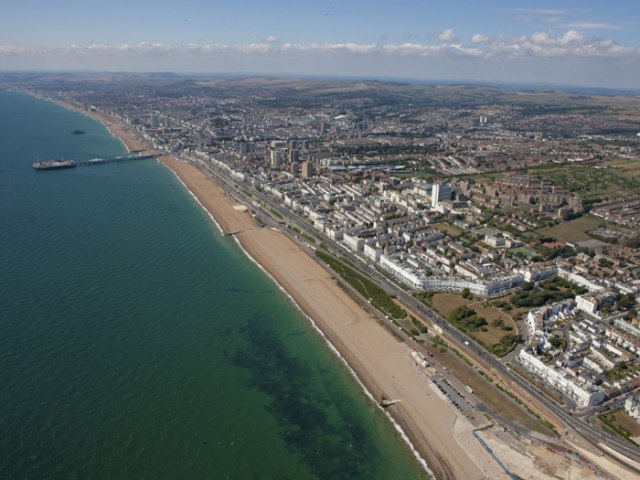 Aerial view of Brighton seafront with The Palace Pier an Hove seafront in the background