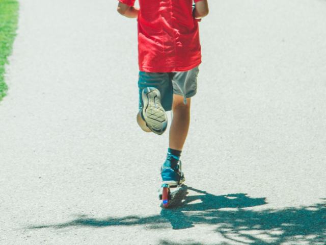 Boy on a scooter