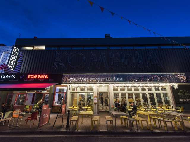 Komedia cinema and theatre, with restaurant next door, in Brighton's North Laines, at night. Photo courtesy Adam Bronkhorst