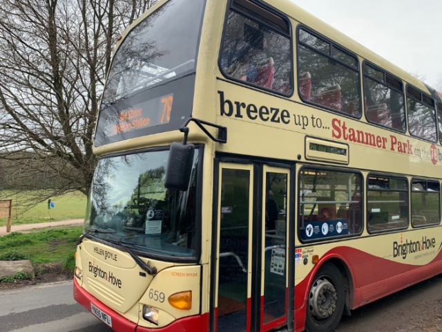 A double decker bus with the number 78 on the front and words on the side reading 'Breeze up to Stanmer Park'