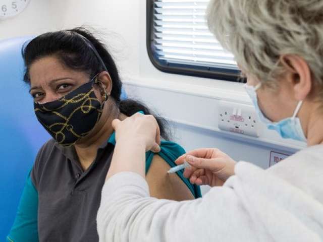 Woman being vaccinated