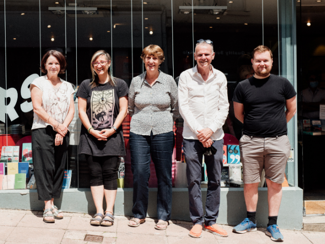 Councillor Martin Osborne outside the front of The Book Makers pop-up on a sunny day alongside Jane McMorrow of Creative Future and co-creator of The Book Makers William Shaw amongst other writers.