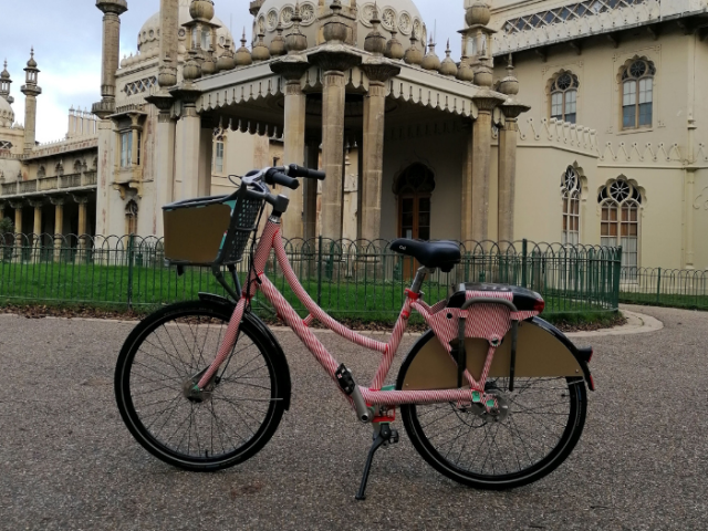 A bike in front of a building