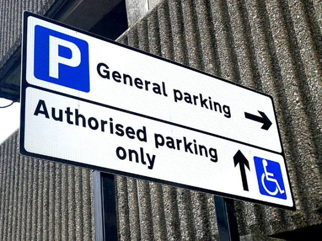 A picture of a sign which reads 'general parking' and 'authorised parking only'