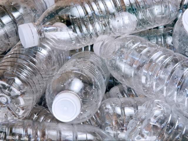 A photo of several plastic water bottles