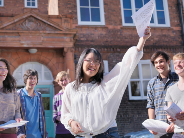 Students celebrating their GCSE results.