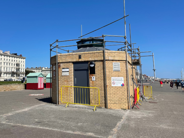 Photograph of brown brick public toilet block on Brighton & Hove seafront.