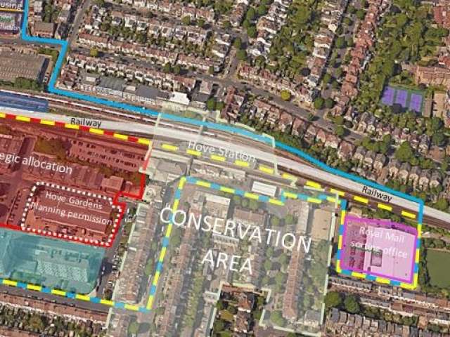 An aerial view of the area around Hove station with an overlay of markings showing the boundaries of areas designed as conservation areas and housing developments.