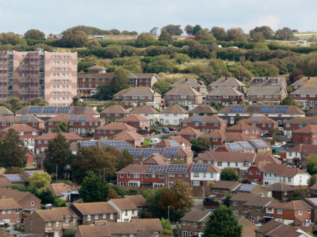 Photo looking across the rooftops of a range of council housing in Brighton & Hove