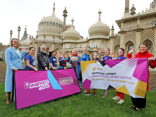 Pic of councillors and rugby players holding Rugby World Cup banners outside the Royal Pavilion