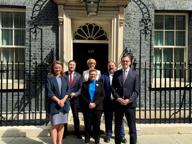 Councillor Bella Sankey standing outside 10 Downing Street with other leaders from the LGA