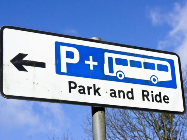 A road sign saying 'Park and Ride'