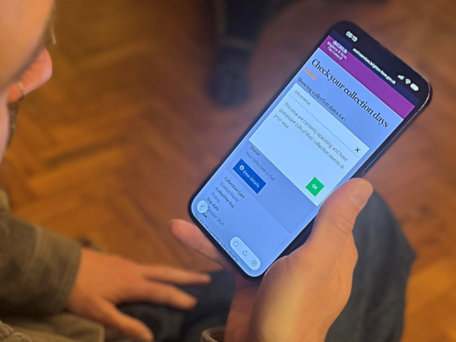 Mobile phone screen showing someone checking their collection information.