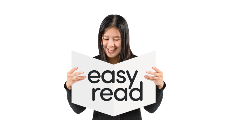 Person reading an easy read document.