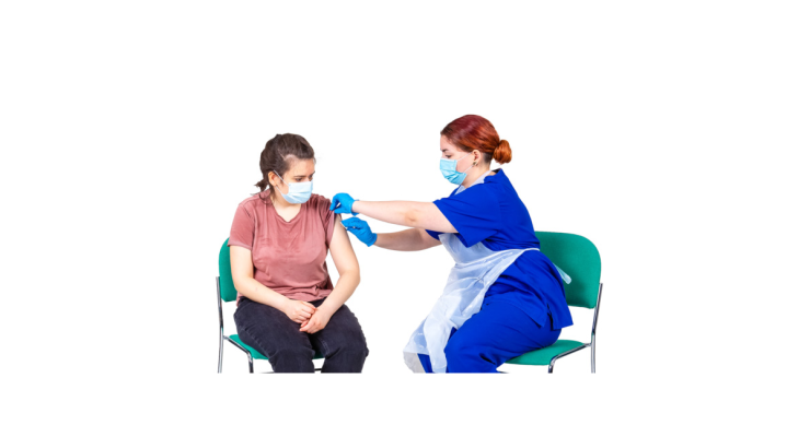 Patient receiving a vaccine injection from a professional.